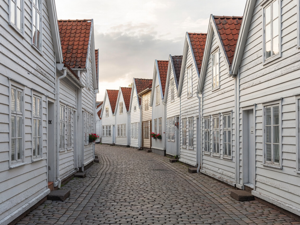 Gamle Stavanger preserved white wooden 18th century cottages on cobblestone street
